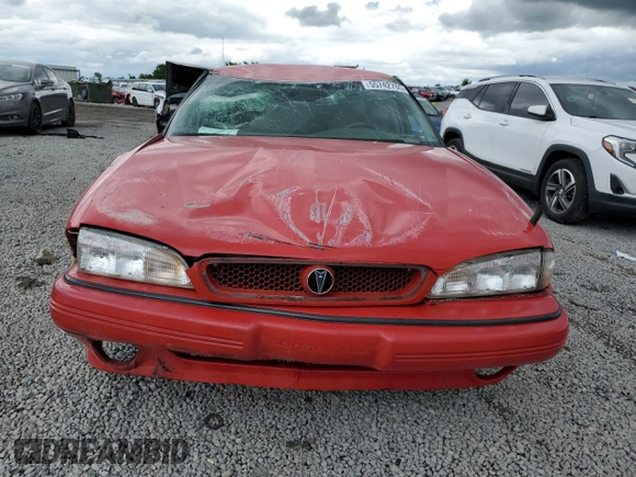 1994 Pontiac Bonneville с VIN 1G2HX52L3R4224473, выставлен на аукционе Copart как лот 55742765 с пробегом 145 767 миль миль и Списание • Salvage title. История ставок и продаж доступна на DreamBid. Изображение 5.