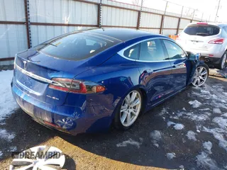 2020 Tesla Model S Long Range with VIN 5YJSA1E26LF410779, listed as a IAAI auction lot 41241192 with 68,764 mi miles and . Bid and sale history available at DreamBid. Image 4.