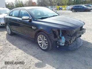 2013 Ford Taurus Limited z VIN 1FAHP2J88DG100817, wystawiony jako IAAI lot #42170346 z przebiegiem 156 396 mil mil oraz . Historia ofert i sprzedaży dostępna na DreamBid. Obrazek 1.