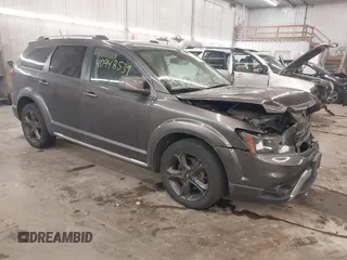 2018 Dodge Journey Crossroad with VIN 3C4PDDGG4JT388786, listed as a IAAI auction lot 40948539 with 122,449 mi miles. Bid and sale history available at carsss.com. Image 1.