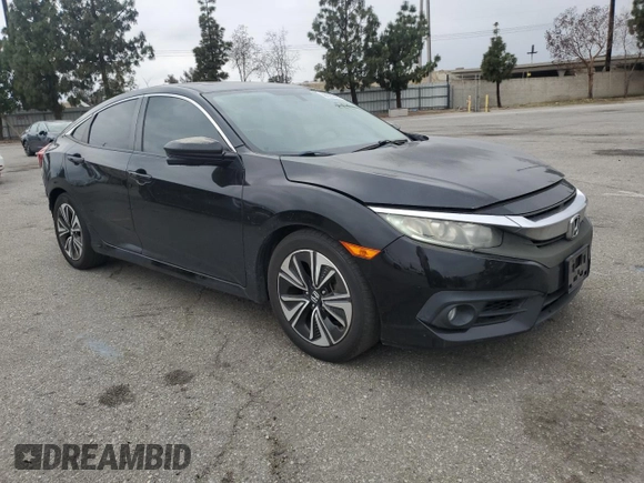 2016 Honda Civic EX-T z VIN 2HGFC1F33GH634029, wystawiony jako Copart lot #56026045 z przebiegiem 168 676 mil mil oraz Szkoda całkowita • Salvage title. Historia ofert i sprzedaży dostępna na DreamBid. Obrazek 4.