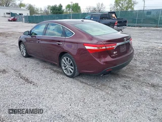2015 Toyota Avalon Limited with VIN 4T1BK1EB9FU177047, listed as a IAAI auction lot 41971667 with 100,811 mi miles and . Bid and sale history available at DreamBid. Image 3.