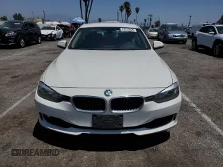 2015 BMW 3 Series 328i with VIN WBA3C1C56FK122177, listed as a Copart auction lot 57333625 with 102,399 mi miles and Salvage title. Bid and sale history available at DreamBid. Image 5.