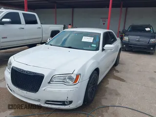 2013 Chrysler 300 with VIN 2C3CCAAG9DH588198, listed as a IAAI auction lot 42556294 with 171,765 mi miles and . Bid and sale history available at DreamBid. Image 2.