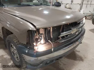2004 Chevrolet Tahoe LS with VIN 1GNEK13Z34J166486, listed as a IAAI auction lot 41821497 with 164,388 mi miles. Bid and sale history available at carsss.com. Image 6.