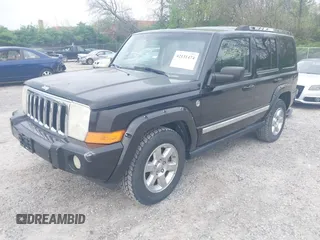 2008 Jeep Commander Limited with VIN 1J8HG58238C198514, listed as a IAAI auction lot 42131474 with 190,995 mi miles. Bid and sale history available at carsss.com. Image 2.