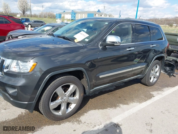 2011 Jeep Grand Cherokee Limited with VIN 1J4RR5GG4BC624876, listed as a IAAI auction lot 41877272 with 166,810 mi miles. Bid and sale history available at carsss.com. Image 2.