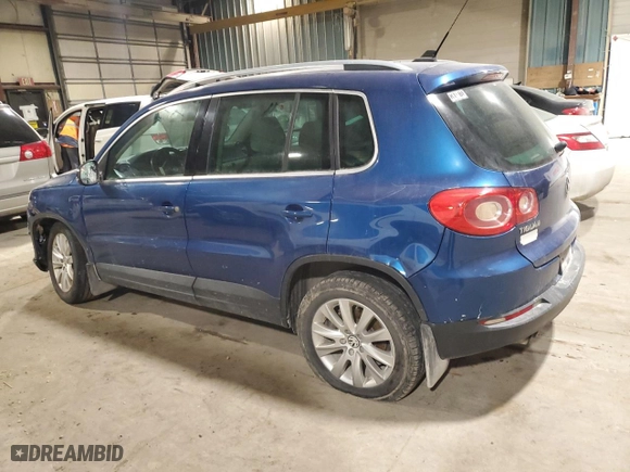 2009 Volkswagen Tiguan S with VIN WVGAV75N99W001723, listed as a Copart auction lot 43312365 with 193,171 mi miles and Salvage Title. Bid and sale history available at carsss.com. Image 2.
