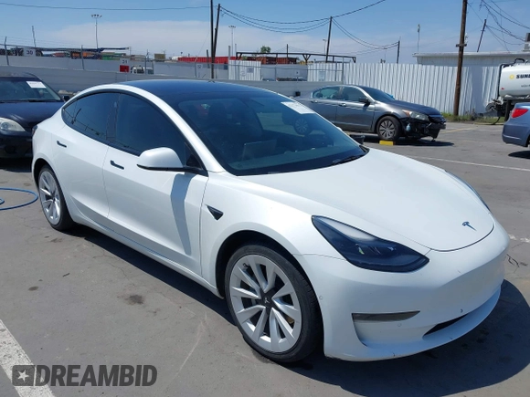 2022 Tesla Model 3 Long Range z VIN 5YJ3E1EB9NF113601, wystawiony jako IAAI lot #42173612 z przebiegiem 95 454 mil mil oraz . Historia ofert i sprzedaży dostępna na DreamBid. Obrazek 1.