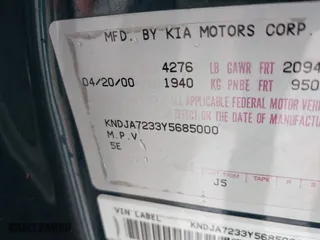 2000 Kia Sportage with VIN KNDJA7233Y5685000, listed as a IAAI auction lot 42005169 with 221,447 mi miles. Bid and sale history available at carsss.com. Image 9.