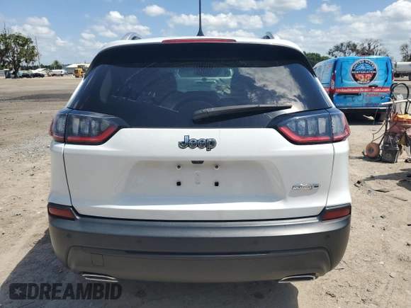 2020 Jeep Cherokee Lux with VIN 1C4PJLLX4LD517207, listed as a Copart auction lot 59304434 with 56,952 mi miles and Non repairable. Bid and sale history available at DreamBid. Image 6.
