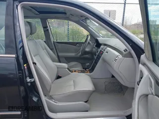 2002 Mercedes-Benz E-Class with VIN WDBJF65J52B496832, listed as a IAAI auction lot 42202331 with 156,304 mi miles. Bid and sale history available at carsss.com. Image 5.