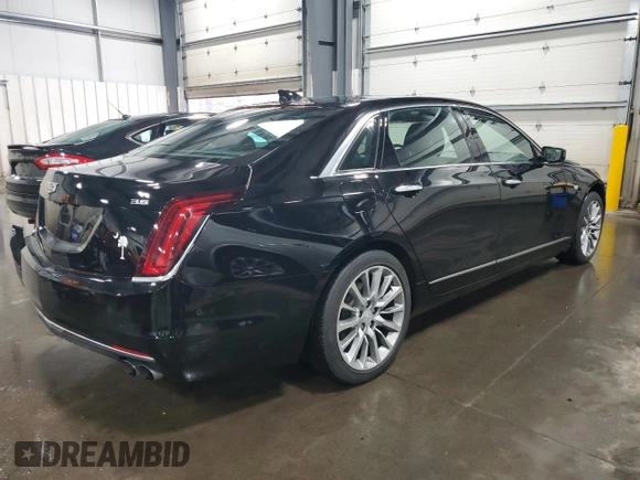 2018 Cadillac CT6 Luxury AWD z VIN 1G6KD5RSXJU102871, wystawiony jako Copart lot #54579165 z przebiegiem 31 219 mil mil oraz Szkoda całkowita • Salvage title. Historia ofert i sprzedaży dostępna na DreamBid. Obrazek 3.