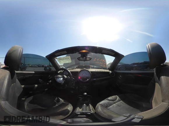 2012 MINI Roadster S with VIN WMWSY3C56CT144520, listed as a IAAI auction lot 41818205 with 86,836 mi miles and . Bid and sale history available at DreamBid. Image 18.