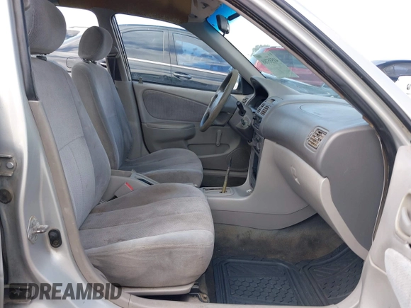 2002 Toyota Corolla CE with VIN 1NXBR12E12Z639542, listed as a IAAI auction lot 41535788 with 204,999 mi miles and . Bid and sale history available at DreamBid. Image 5.