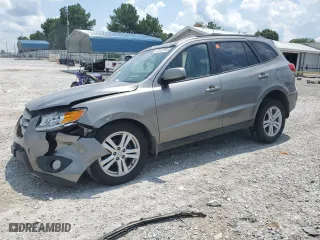 2012 Hyundai Santa Fe SE with VIN 5XYZHDAG2CG106869, listed as a Copart auction lot 75944384 with 186,373 mi miles and Salvage Title. Bid and sale history available at carsss.com. Image 1.