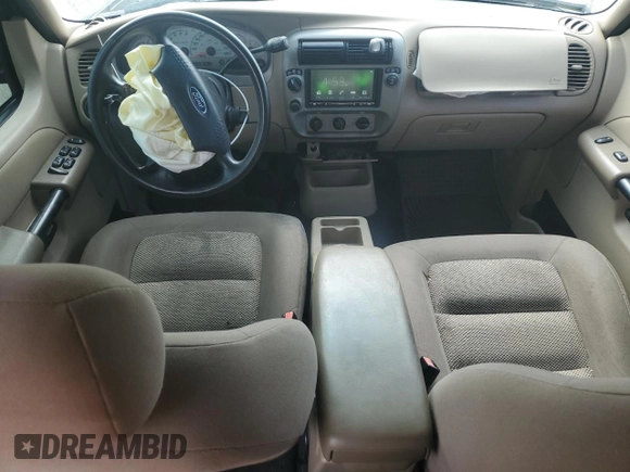 2004 Ford Explorer Sport Trac XLS z VIN 1FMZU77K24UB43103, wystawiony jako Copart lot #55955144 z przebiegiem 197 274 mil mil oraz Szkoda całkowita • Salvage title. Historia ofert i sprzedaży dostępna na DreamBid. Obrazek 8.