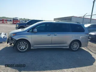 2011 Toyota Sienna SE with VIN 5TDXK3DC8BS131434, listed as a IAAI auction lot 42002675 with 209,396 mi miles. Bid and sale history available at carsss.com. Image 15.