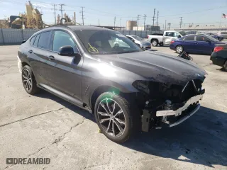 2022 BMW X4 xDrive30i with VIN 5UX33DT01N9L78188, listed as a Copart auction lot 57873752 with 5,151 mi miles. Bid and sale history available at carsss.com. Image 1.