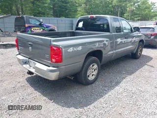 2005 Dodge Dakota SLT with VIN 1D7HW42N25S155393, listed as a IAAI auction lot 42727690 with 230,042 mi miles and . Bid and sale history available at DreamBid. Image 4.