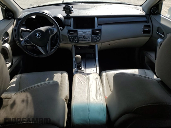 2010 Acura RDX z VIN 5J8TB2H27AA004794, wystawiony jako Copart lot #51976545 z przebiegiem Nie podano mil oraz Szkoda całkowita • Salvage title. Historia ofert i sprzedaży dostępna na DreamBid. Obrazek 8.