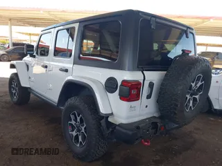 2020 Jeep Wrangler Unlimited Rubicon with VIN 1C4HJXFGXLW107958, listed as a IAAI auction lot 42058477 with 69,951 mi miles and . Bid and sale history available at DreamBid. Image 3.