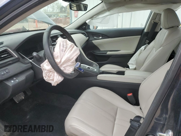 2019 Honda Insight Touring with VIN 19XZE4F91KE013243, listed as a Copart auction lot 52947255 with 25,236 mi miles and Salvage Title. Bid and sale history available at carsss.com. Image 7.