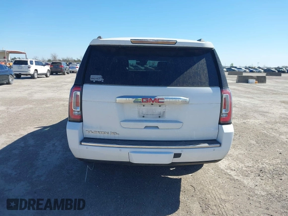2020 GMC Yukon XL Denali with VIN 1GKS2HKJ9LR298494, listed as a IAAI auction lot 41817872 with 111,730 mi miles. Bid and sale history available at carsss.com. Image 16.