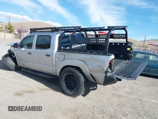 2013 Toyota Tacoma with VIN 5TFLU4EN2DX049615, listed as a IAAI auction lot 41893876 with 160,752 mi miles and . Bid and sale history available at DreamBid. Image 3.