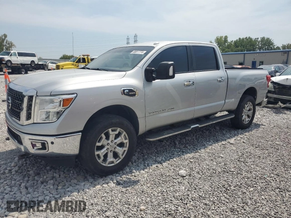 2016 Nissan Titan XD Platinum Reserve with VIN 1N6BA1F45GN514023, listed as a Copart auction lot 68817774 with 207,822 mi miles and Salvage Title. Bid and sale history available at carsss.com. Image 1.