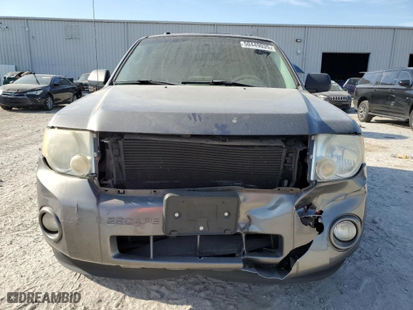 2010 Ford Escape XLT with VIN 1FMCU0DG6AKD05058, listed as a Copart auction lot 50449035 with 127,781 mi miles and Salvage Title. Bid and sale history available at carsss.com. Image 5.