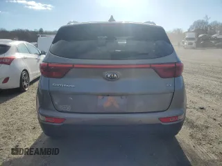 2018 Kia Sportage EX z VIN KNDPNCAC1J7308457, wystawiony jako Copart lot #81574704 z przebiegiem Nie podano mil oraz Szkoda całkowita • Salvage title. Historia ofert i sprzedaży dostępna na DreamBid. Obrazek 6.