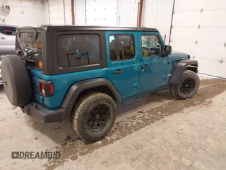 2019 Jeep Wrangler Unlimited Sport Altitude with VIN 1C4HJXDG0KW617379, listed as a IAAI auction lot 42005517 with 91,296 mi miles and . Bid and sale history available at DreamBid. Image 4.