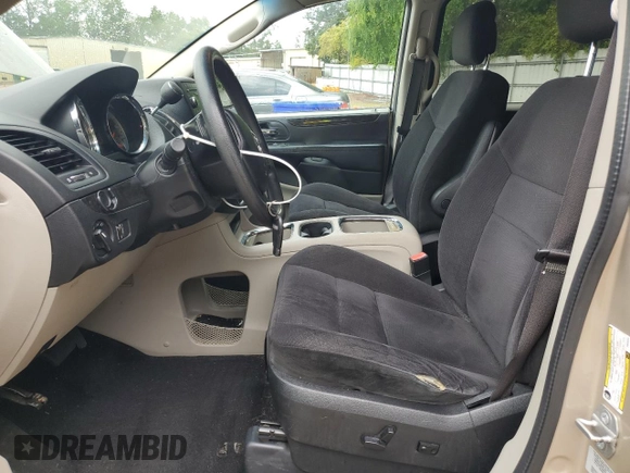 2015 Dodge Grand Caravan SXT with VIN 2C4RDGCG7FR536049, listed as a Copart auction lot 55963115 with 141,228 mi miles and Clean Title. Bid and sale history available at DreamBid. Image 7.