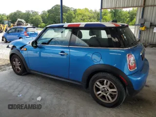 2011 MINI Hardtop with VIN WMWSU3C52BT252207, listed as a Copart auction lot 62735905 with 121,121 mi miles and Salvage title. Bid and sale history available at DreamBid. Image 2.