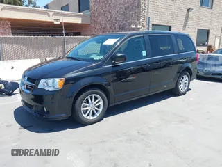 2018 Dodge Grand Caravan SXT z VIN 2C4RDGCG1JR223362, wystawiony jako IAAI lot #42317394 z przebiegiem 70 937 mil mil oraz . Historia ofert i sprzedaży dostępna na DreamBid. Obrazek 2.