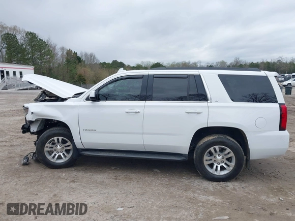 2020 Chevrolet Tahoe LT with VIN 1GNSKBKC2LR253012, listed as a IAAI auction lot 41870002 with 127,789 mi miles and . Bid and sale history available at DreamBid. Image 14.