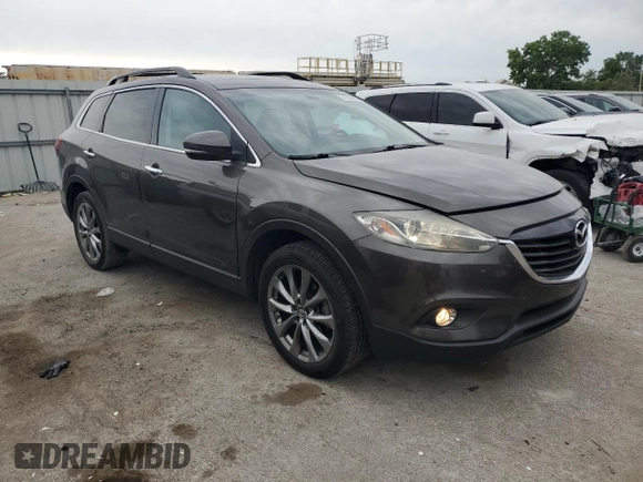 2015 Mazda CX-9 Grand Touring z VIN JM3TB2DA0F0468350, wystawiony jako Copart lot #61545095 z przebiegiem 154 050 mil mil oraz Szkoda całkowita • Salvage title. Historia ofert i sprzedaży dostępna na DreamBid. Obrazek 4.