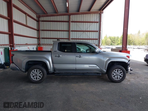 2025 Toyota Tacoma SR with VIN 3TMLB5JN7SM100983, listed as a IAAI auction lot 42220559 with 2,119 mi miles and . Bid and sale history available at DreamBid. Image 14.
