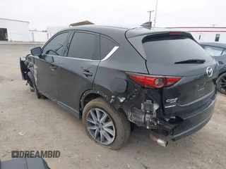 2017 Mazda CX-5 Grand Touring with VIN JM3KFBDL6H0179557, listed as a IAAI auction lot 41546493 with 103,585 mi miles. Bid and sale history available at carsss.com. Image 3.