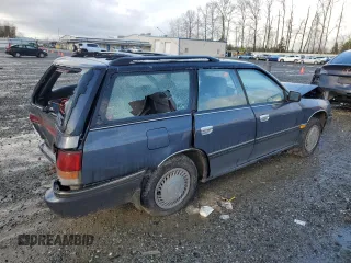 1993 Subaru Legacy L with VIN 4S3BJ6331P7949959, listed as a Copart auction lot 88360485 with 125,562 mi miles and Salvage Title. Bid and sale history available at DreamBid. Image 3.