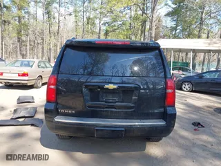 2015 Chevrolet Tahoe LTZ with VIN 1GNSKCKC2FR101306, listed as a IAAI auction lot 41909631 with 218,102 mi miles. Bid and sale history available at carsss.com. Image 16.