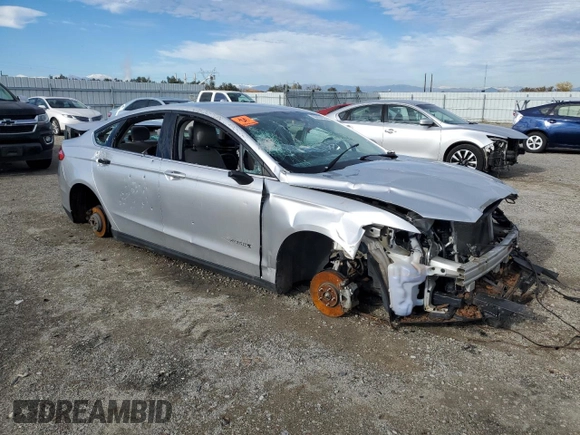 2015 Ford Fusion S Hybrid with VIN 3FA6P0UU6FR157842, listed as a Copart auction lot 83024044 with 0 mi miles and Salvage Title. Bid and sale history available at carsss.com. Image 4.