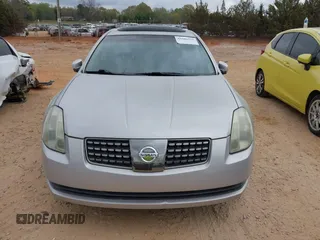 2004 Nissan Maxima SE z VIN 1N4BA41E74C869440, wystawiony jako IAAI lot #41886525 z przebiegiem 130 327 mil mil oraz . Historia ofert i sprzedaży dostępna na DreamBid. Obrazek 6.