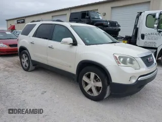 2010 GMC Acadia SLT1 z VIN 1GKLRMED7AJ119329, wystawiony jako IAAI lot #42035437 z przebiegiem 140 815 mil mil oraz . Historia ofert i sprzedaży dostępna na DreamBid. Obrazek 1.