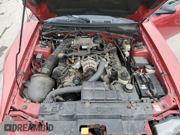 1999 Ford Mustang GT z VIN 1FAFP45X8XF115199, wystawiony jako Copart lot #61419125 z przebiegiem 90 817 mil mil oraz Szkoda całkowita • Salvage title. Historia ofert i sprzedaży dostępna na DreamBid. Obrazek 11.