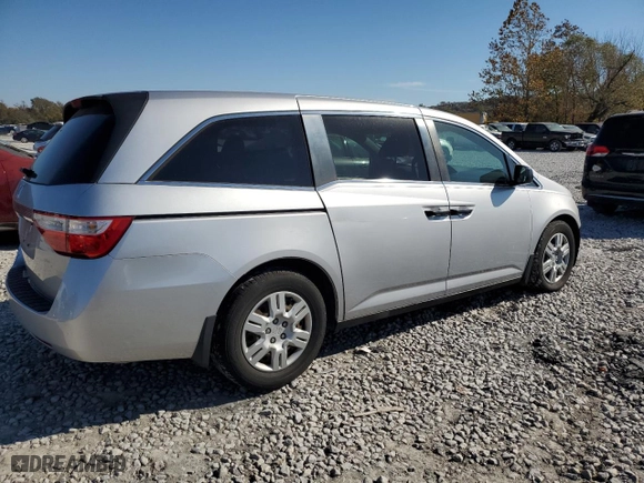 2013 Honda Odyssey LX with VIN 5FNRL5H24DB028814, listed as a Copart auction lot 77693024 with 149,421 mi miles and Salvage Title. Bid and sale history available at carsss.com. Image 3.