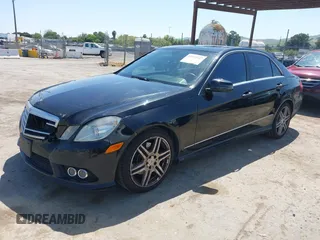2010 Mercedes-Benz E-Class E 350 Luxury with VIN WDDHF5GB0AA072193, listed as a IAAI auction lot 42031041 with 152,969 mi miles. Bid and sale history available at carsss.com. Image 2.