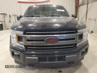 2020 Ford F-150 XL with VIN 1FTEW1E59LFA01308, listed as a Copart auction lot 52005385 with 63,711 mi miles and Salvage Title. Bid and sale history available at carsss.com. Image 5.