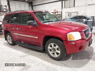 2005 GMC Envoy SLT with VIN 1GKDT13S352324863, listed as a IAAI auction lot 41707649 with 247,326 mi miles. Bid and sale history available at carsss.com. Image 1.